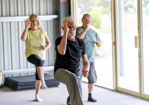 Older adults doing yoga
